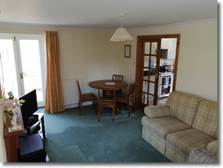 the arches holiday cottage sitting room